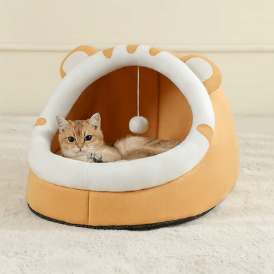 adorable chat installe dans niche pour chat jaune