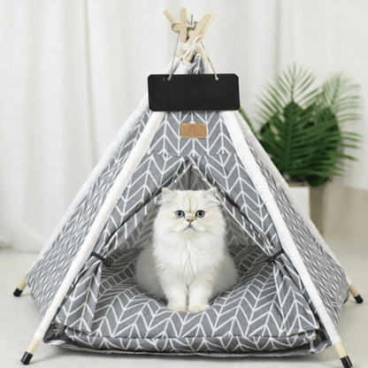 chat assis dans tente pour chat confortable design chevrons gris