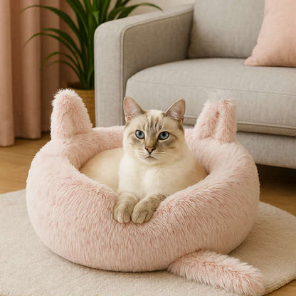 felin beige dans coussin pour chat doux rose rond design chat