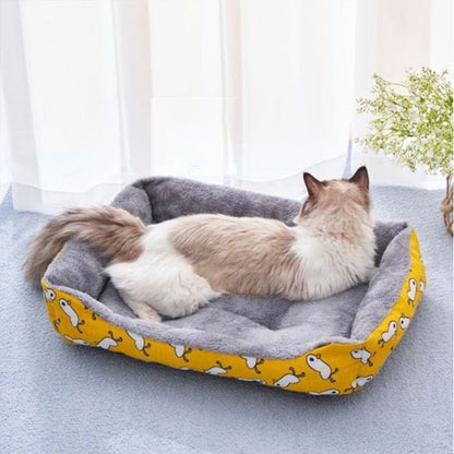 panier chat rectangulaire jaune doux motif canard blanc