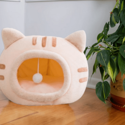 vue pres lit pour chat confortable rose